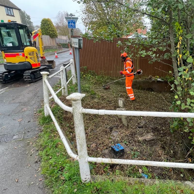 Our teams initiated the project by clearing the bank of vegetation and elimiating the trees.